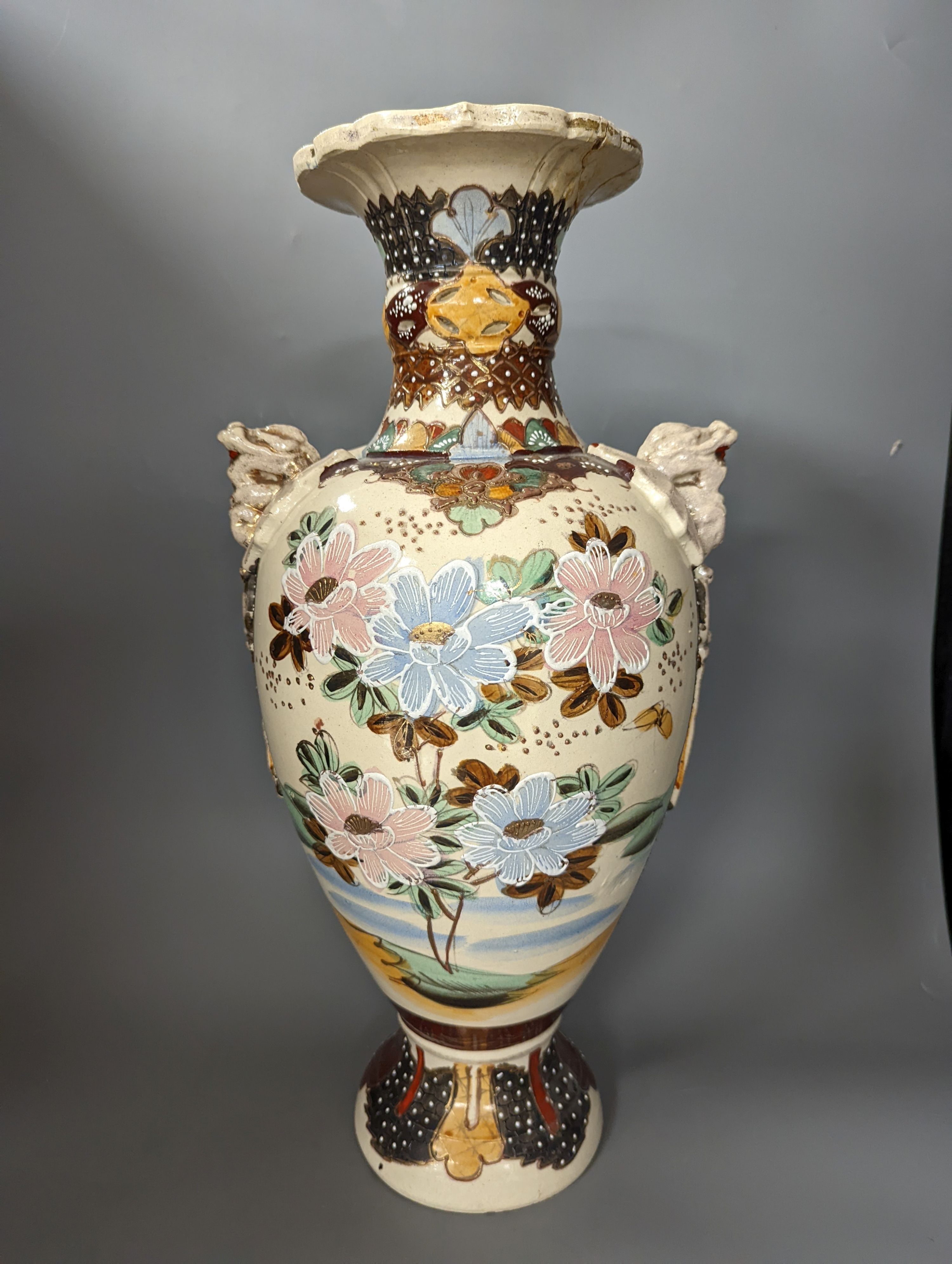 A pair of Japanese crackle ware vases, a lidded vase and 2 others, tallest 60 cms high.